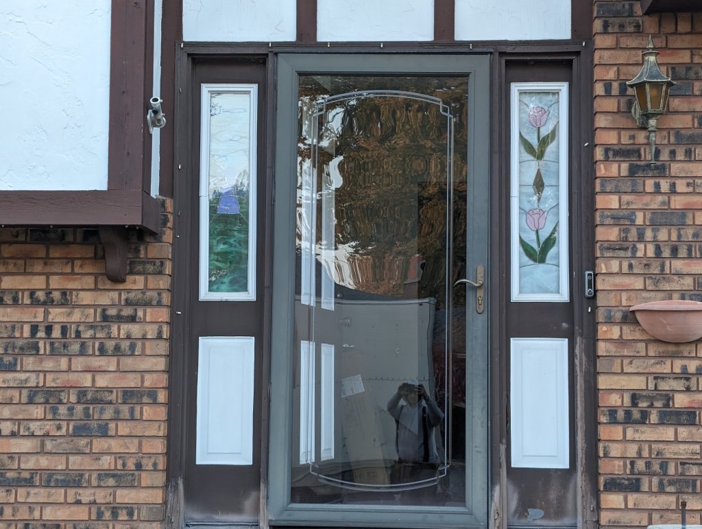 black entry door installation chicago with window