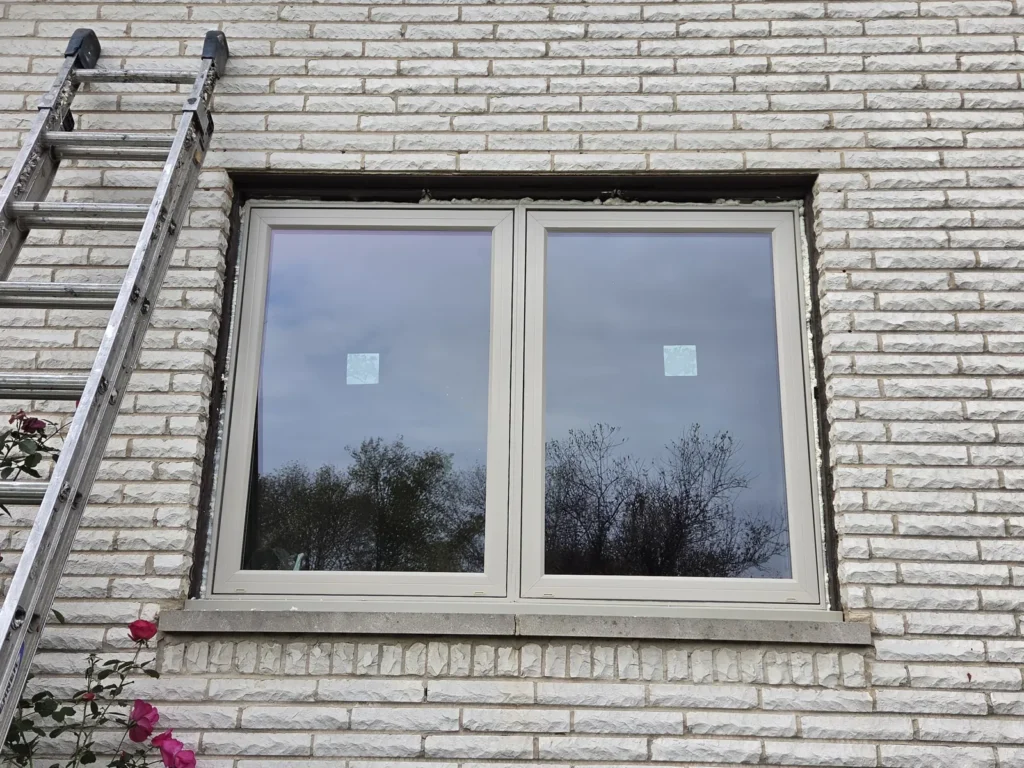 White-framed replacement picture window in a brick wall in Homer Glen