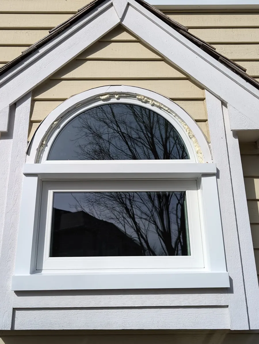 Decorative arched window arrangement at the Aurora home