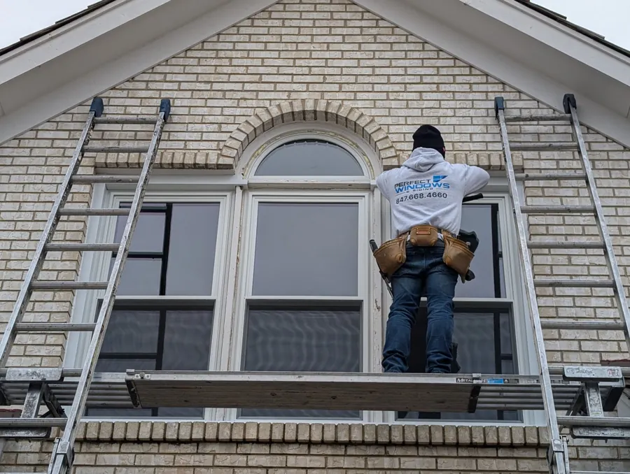 Window installation work at an exterior opening in Aurora