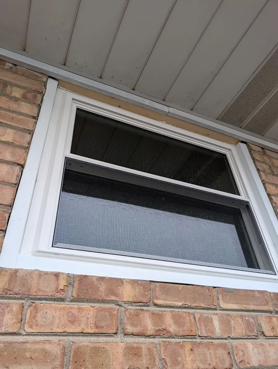 Double-hung window in a brick exterior in Franklin Park