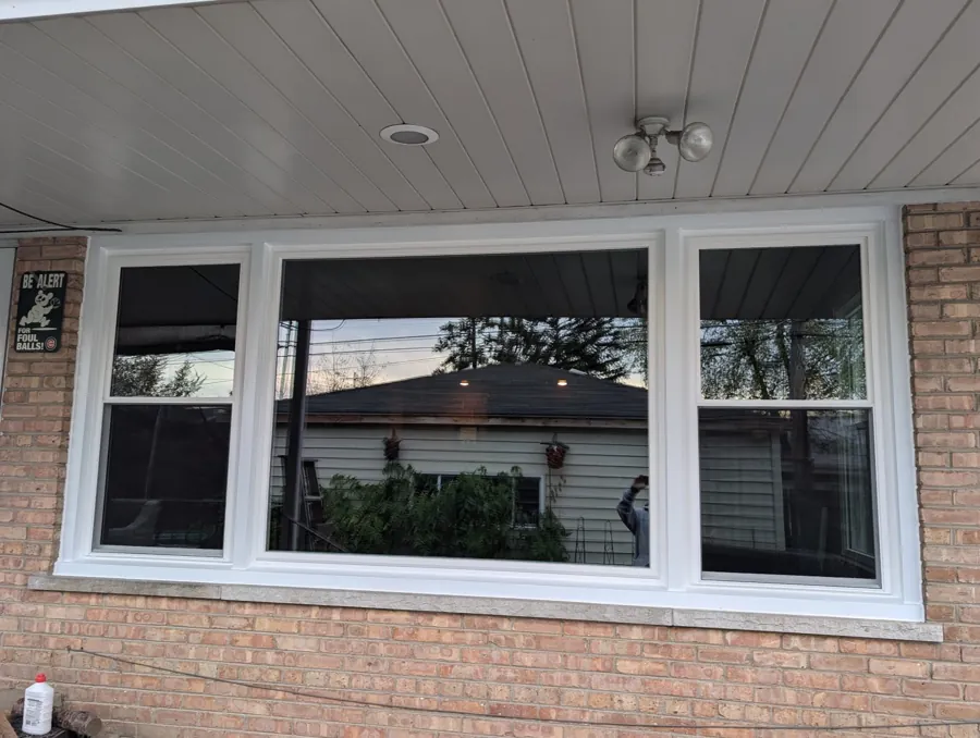 Picture-window arrangement beneath a porch roof in Franklin Park