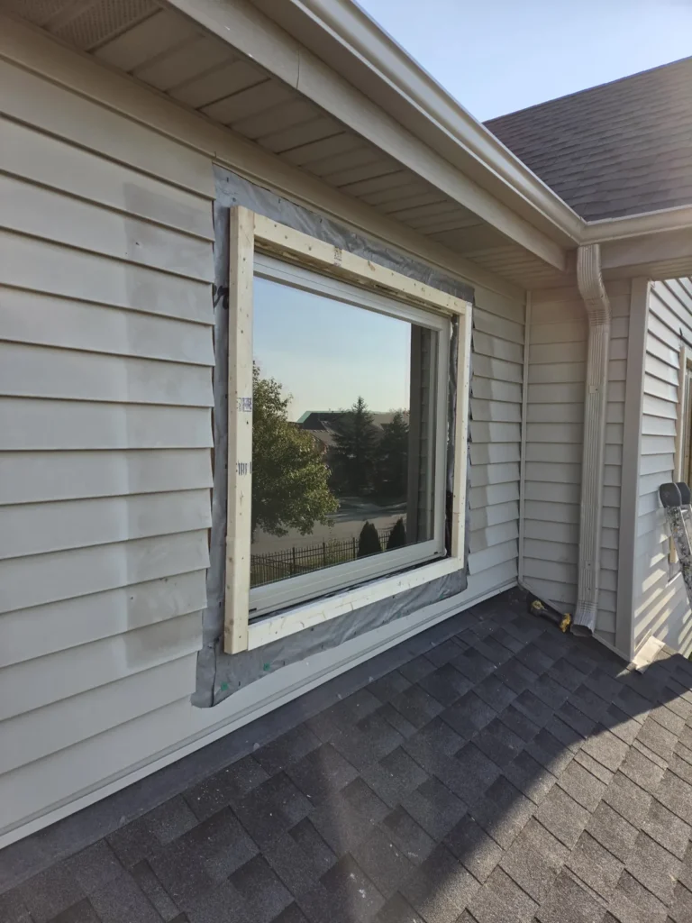 Window opening with exterior trim removed on Campbell Street in Des Plaines
